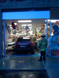 Vehicle into Strip Mall